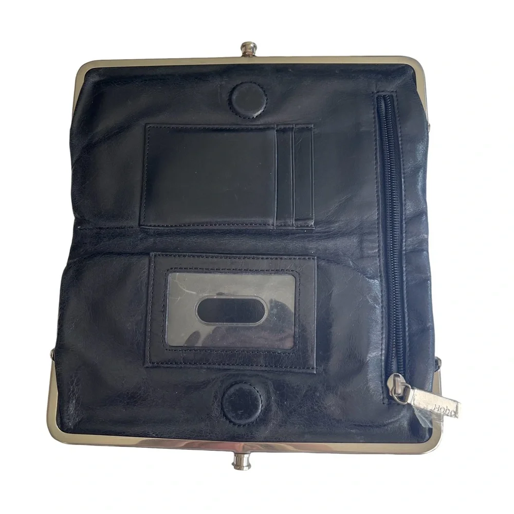 HOBO Black Genuine Leather Clutch Wallet. Like new condition. Very nice.